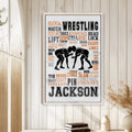 Framed wrestling wall art displayed on a light wood-paneled wall in a calm home interior