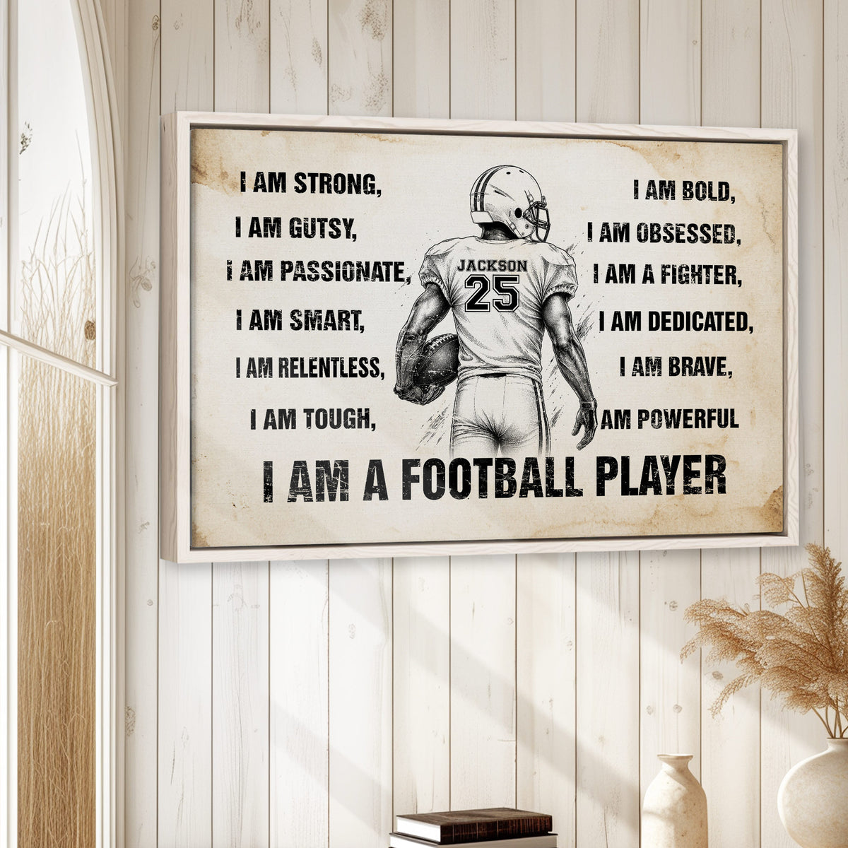 Football wall art displayed in a bright home interior with white wood paneling and natural wood framing