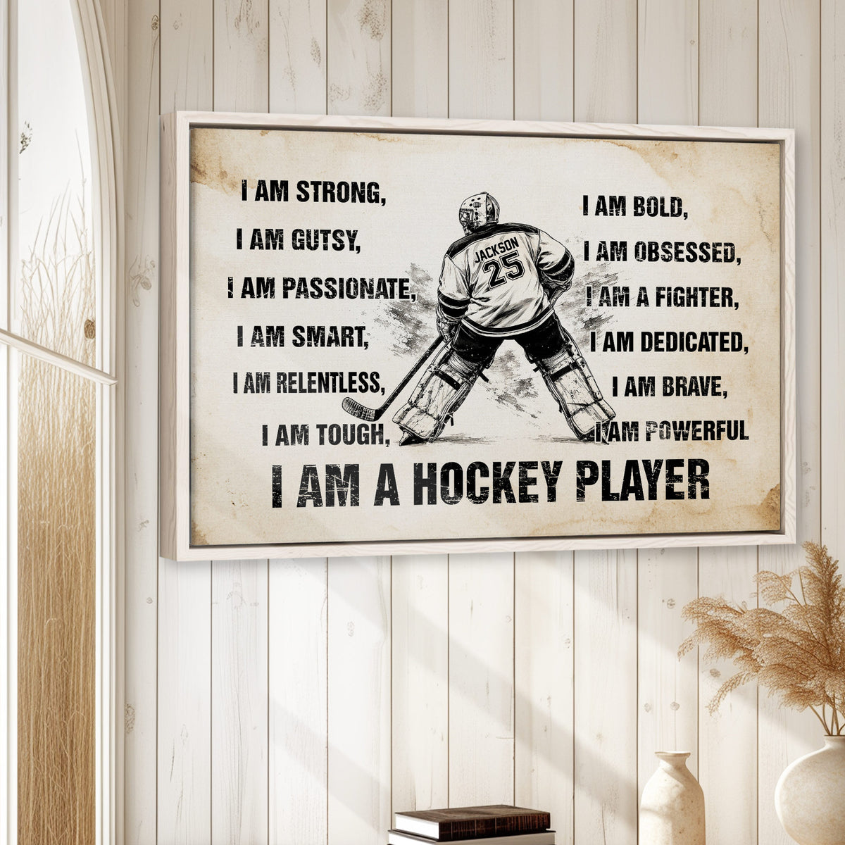 Framed hockey wall art displayed on a light wood-paneled wall in a warm home decor setting