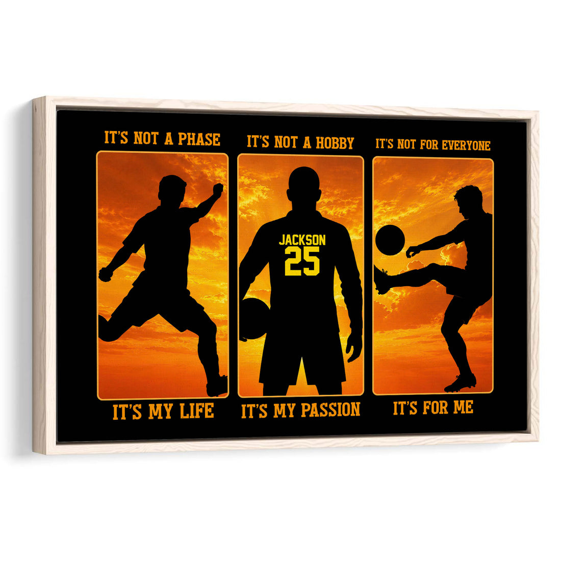 Framed soccer wall art with three black player silhouettes against a vivid orange sunset background