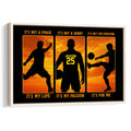 Framed soccer wall art with three black player silhouettes against a vivid orange sunset background