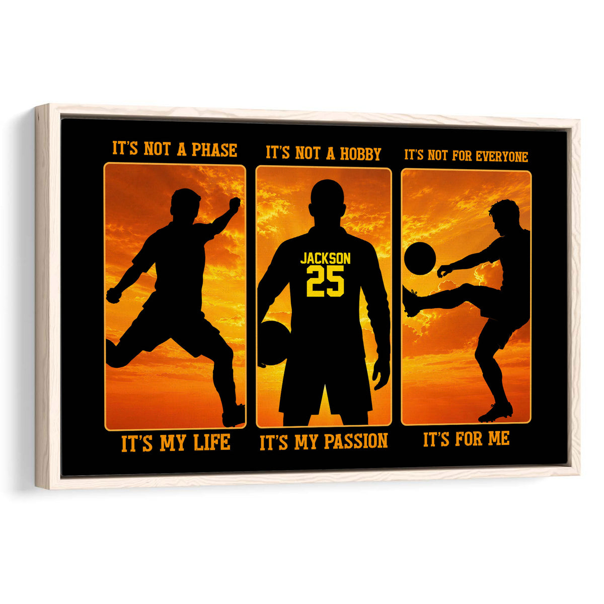 Framed soccer wall art with three black player silhouettes against a vivid orange sunset background