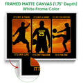 White framed soccer canvas wall art with silhouetted players and vivid orange sky