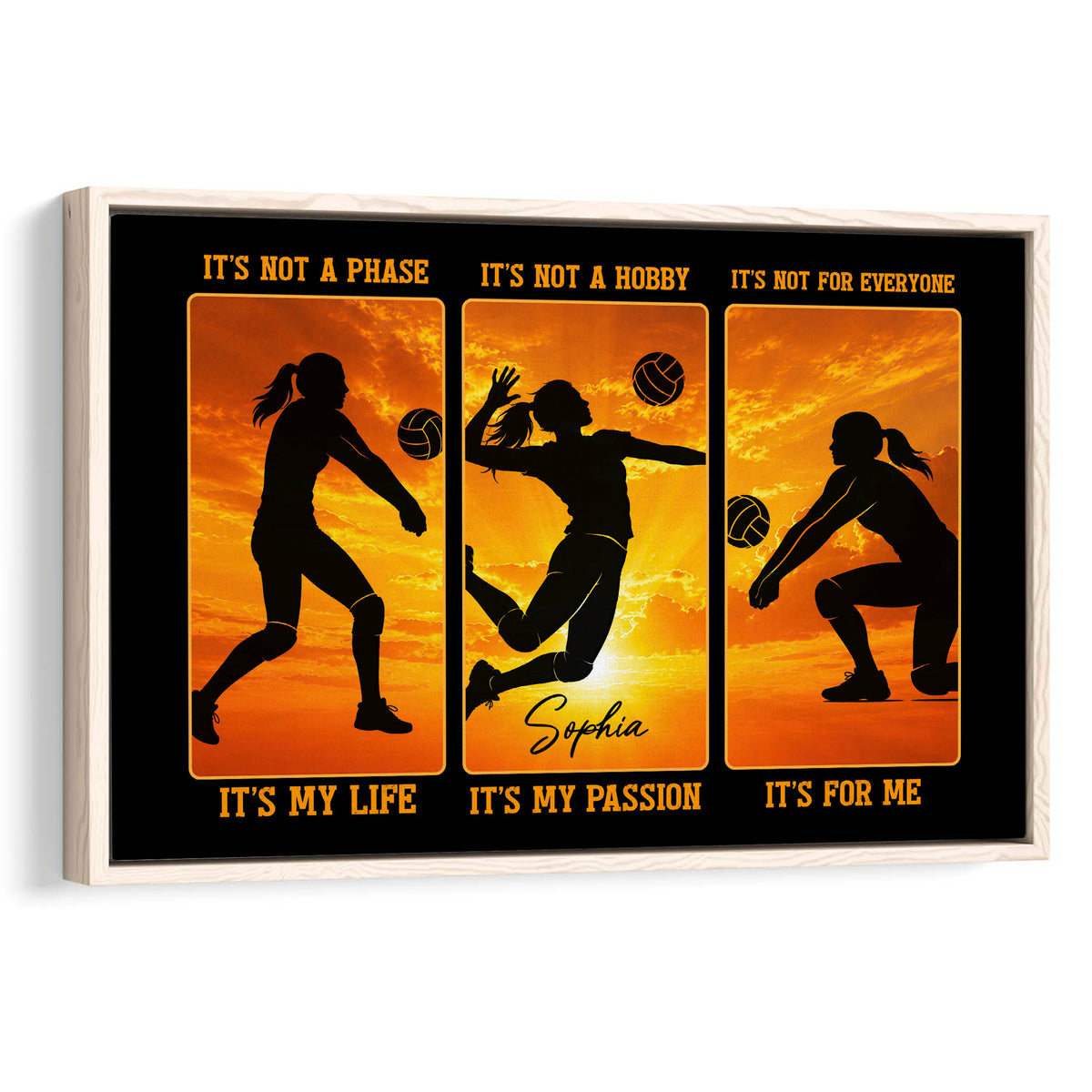 Framed volleyball wall art with three player silhouettes against a vivid orange sunset
