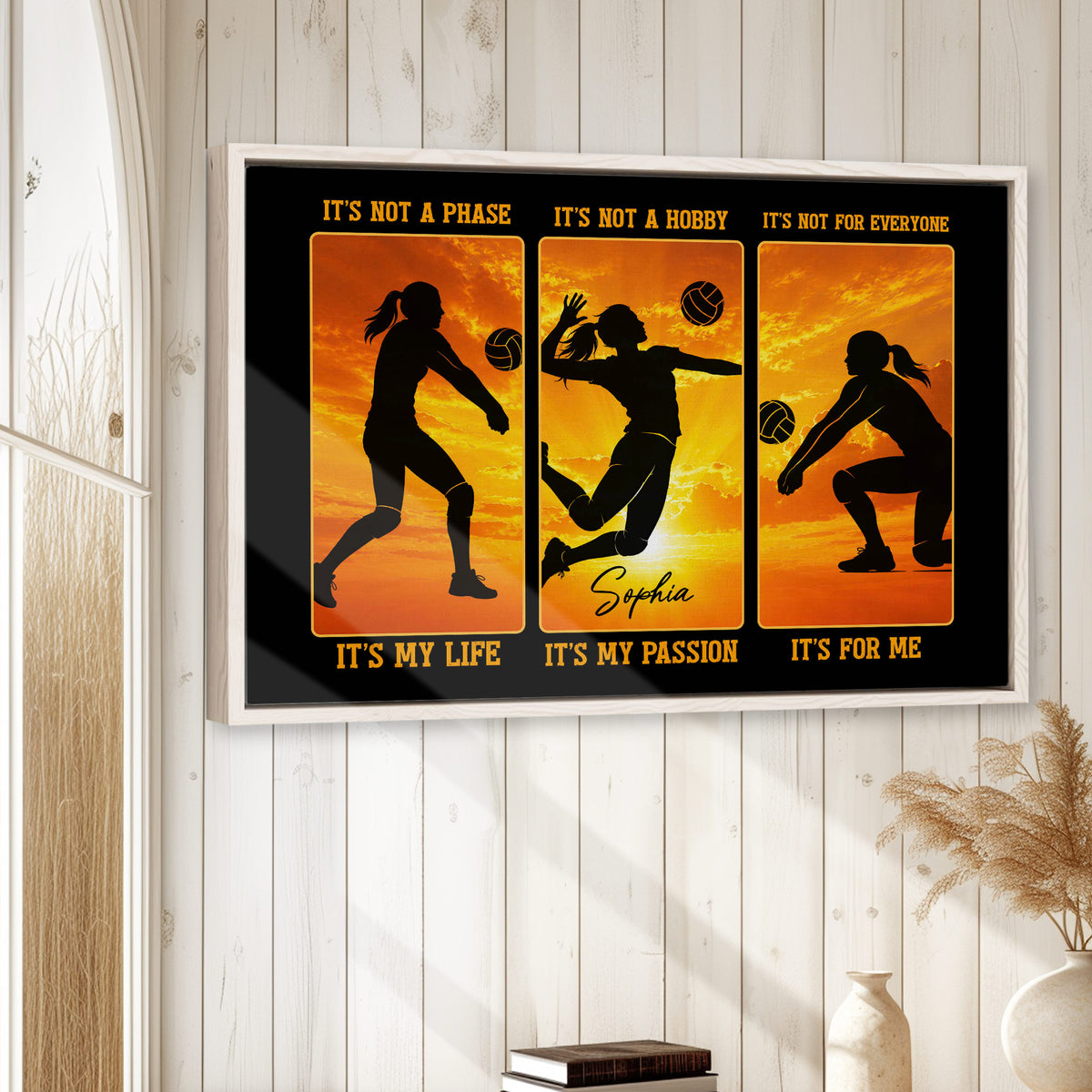 Volleyball wall art displayed in a bright room with white wood walls and natural decor