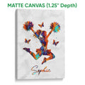 Matte canvas wall art featuring a colorful cheerleader in a dynamic jump with pom-poms