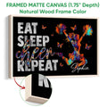 Natural wood framed cheerleading wall art with a colorful cheerleader and vibrant butterfly accents