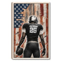 Framed football wall art featuring a player holding a football against a distressed American flag design