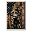 Framed motocross wall art showing a helmeted dirt bike rider against a distressed American flag background