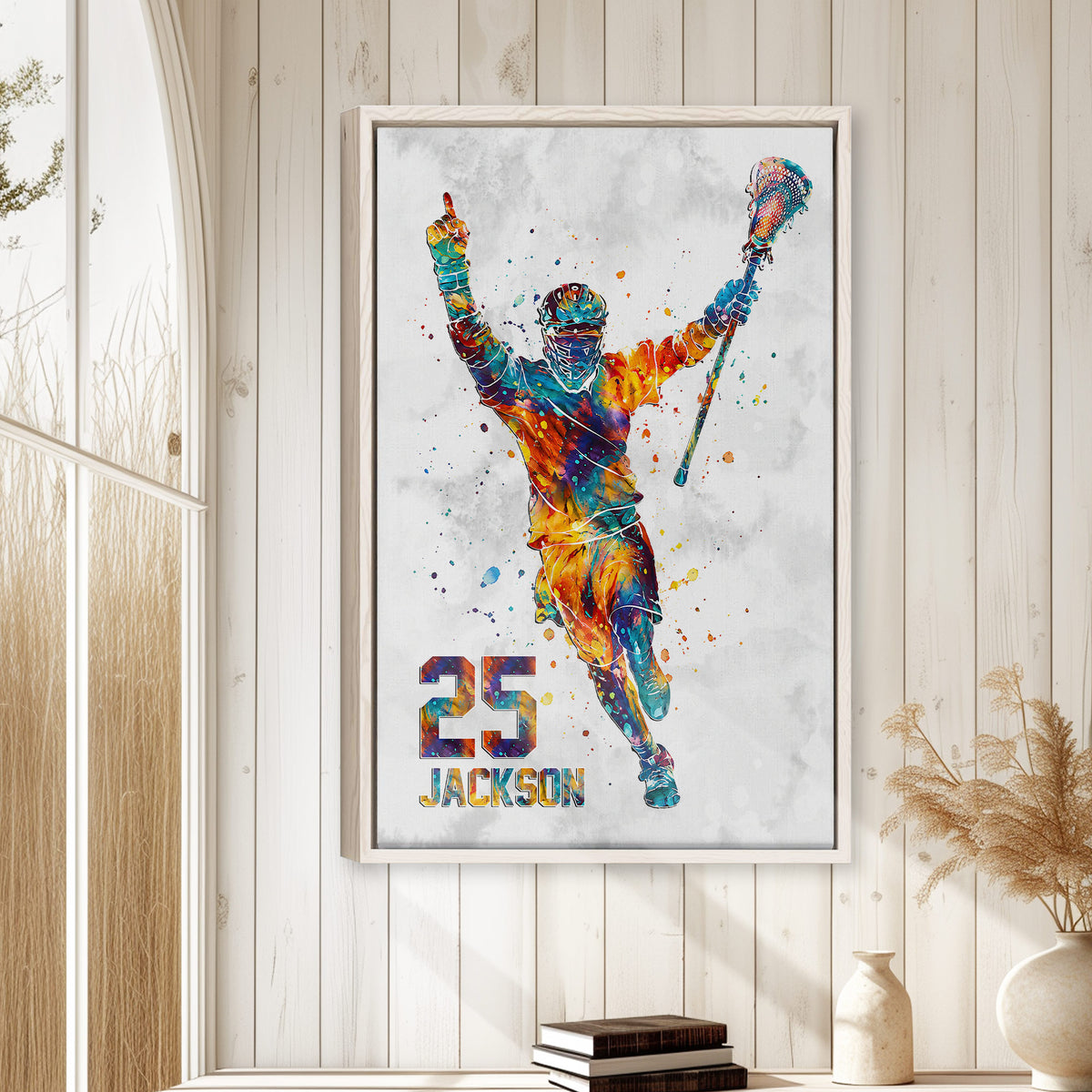 Framed lacrosse wall art displayed on a light wood-paneled wall in a bright home interior