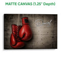 Matte canvas boxing wall art featuring red gloves and a textured industrial backdrop