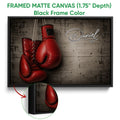 Black framed canvas boxing wall art with red gloves and close-up frame detail