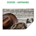 Unframed cowboy poster featuring a brown hat, rope, horseshoes and weathered wood background