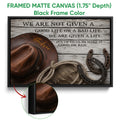 Black framed cowboy canvas showing a hat, rope, horseshoes and rustic typography