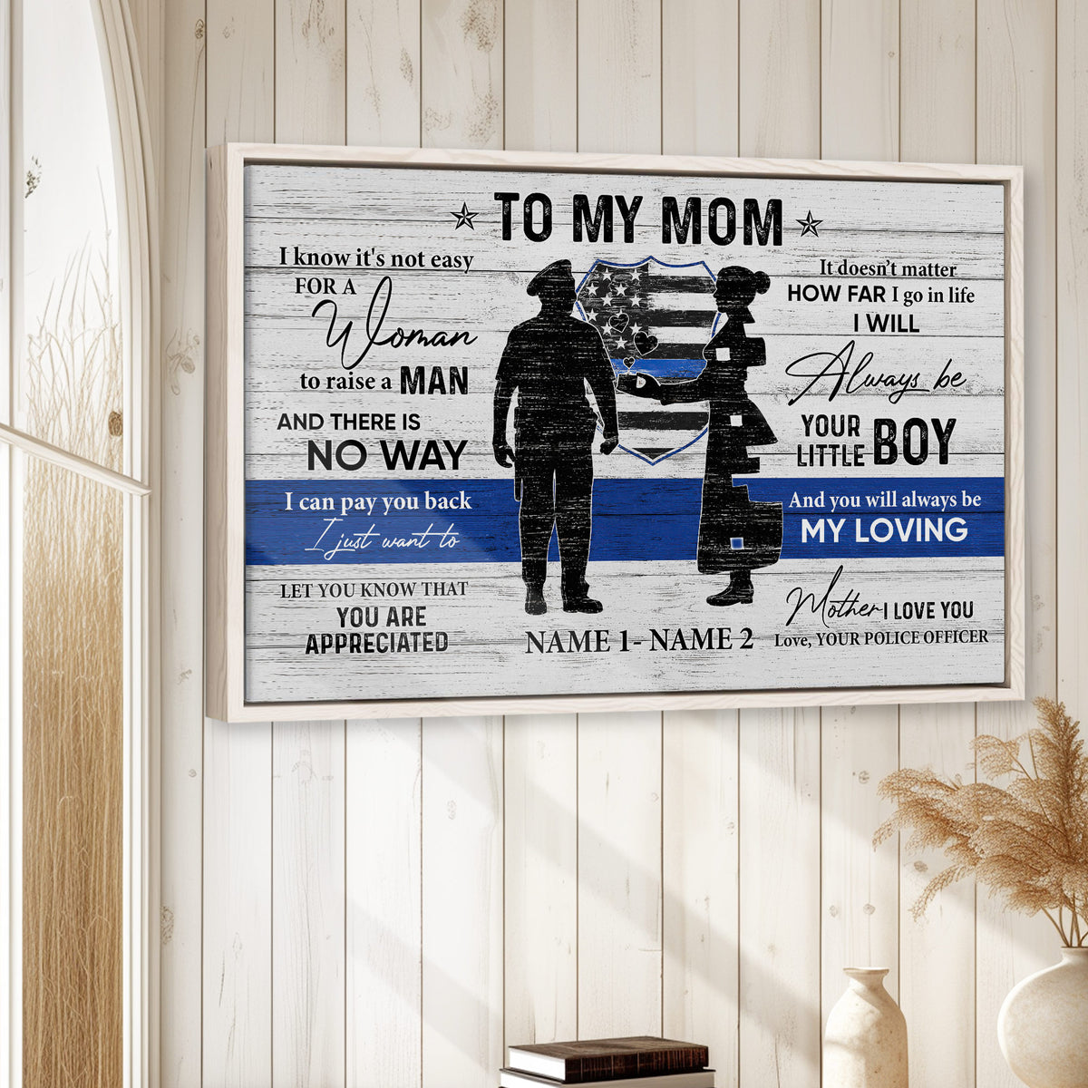 Police officer appreciation wall art displayed in a bright room with white wood paneling and a natural frame