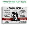 Matte canvas firefighter wall art featuring a mother and child silhouette with red and white accents