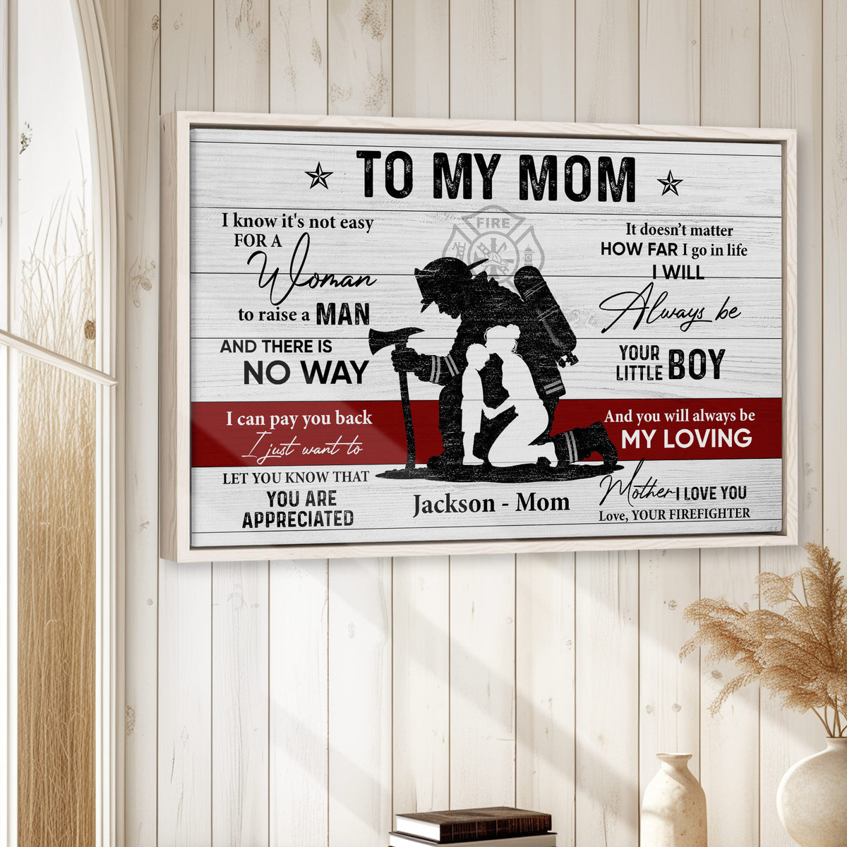 Firefighter mother and child wall art displayed in a bright home with white wood paneling