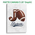 Matte canvas football wall art featuring a brown football and horseshoe on a light textured background