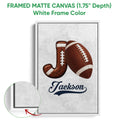 White framed canvas football wall art with a brown football, horseshoe, and textured design