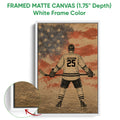 White framed canvas hockey wall art featuring an ice hockey player and textured patriotic backdrop