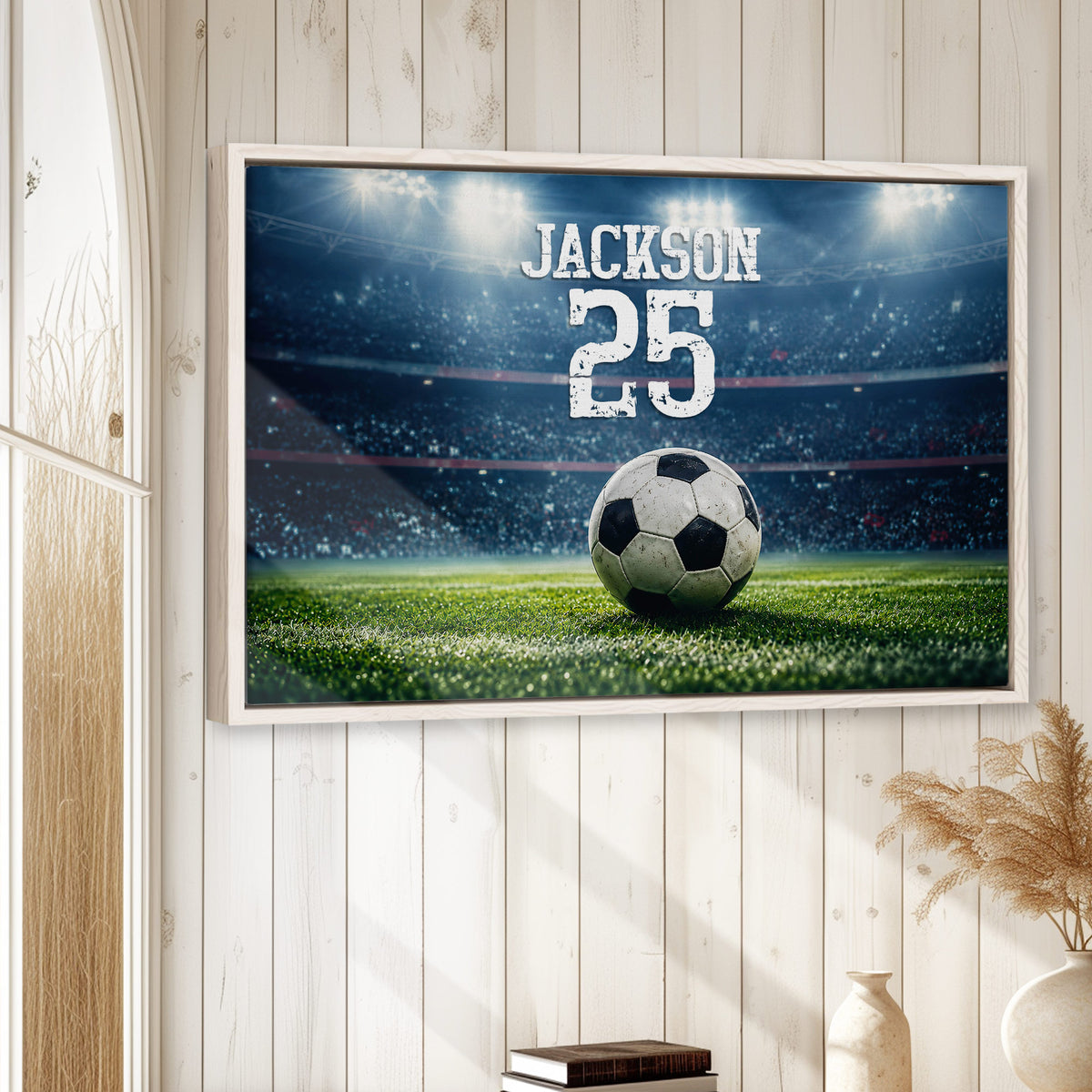 Framed soccer wall art displayed on a light wood-paneled wall in a home interior