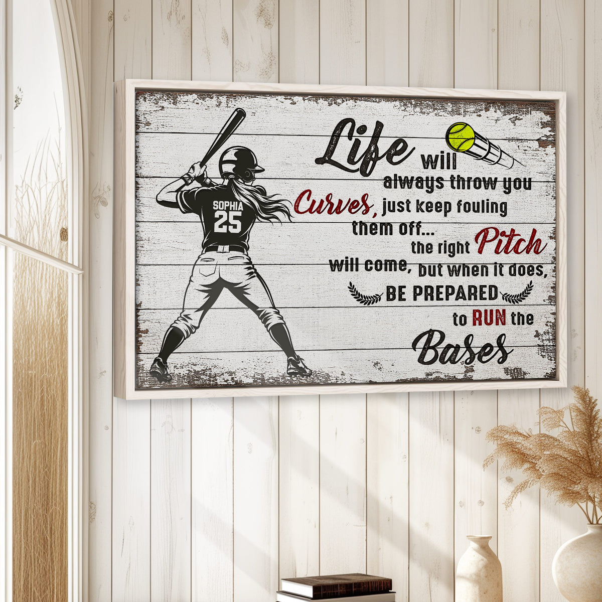 Softball canvas wall art displayed in a bright room with white wood walls and natural wood frame