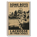 Framed lacrosse wall art featuring a sepia-toned player scene in a light wood frame