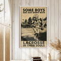 Framed lacrosse wall art displayed on a light wood-paneled wall in a bright home interior