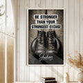 Boxing motivational wall art displayed in a bright room with white paneled walls and neutral decor