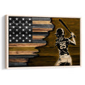 Framed wall art featuring a softball batter silhouette against a distressed American flag wood background