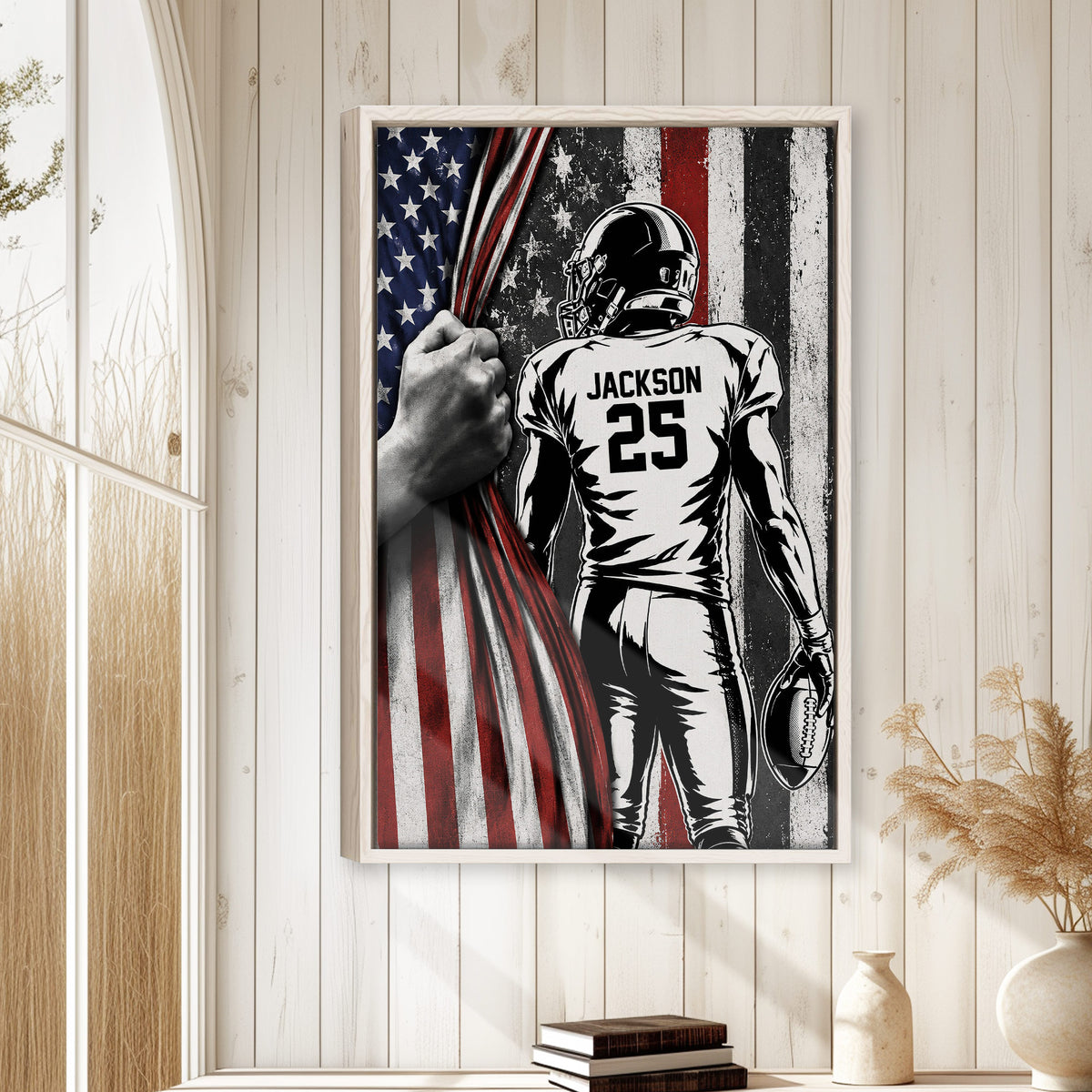 Patriotic football wall art displayed on a light wood-paneled wall in a bright home interior