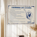 Framed swimming wall art displayed on a light wood-paneled wall in a calm neutral room