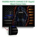 Black framed police canvas wall art with a tactical officer, blue-line flag emblem and fiery dark background