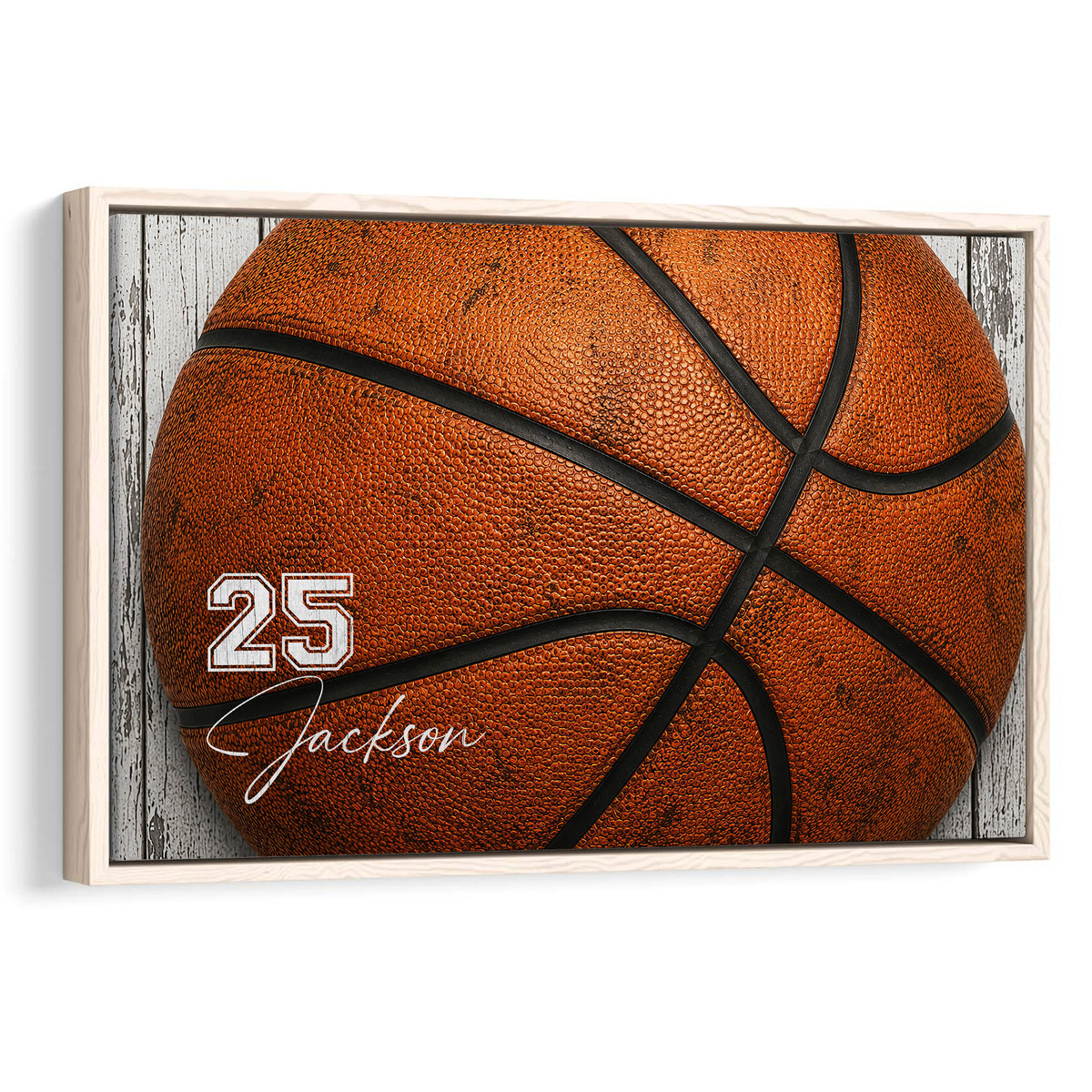 Framed basketball wall art featuring a close-up orange basketball against a rustic wood backdrop