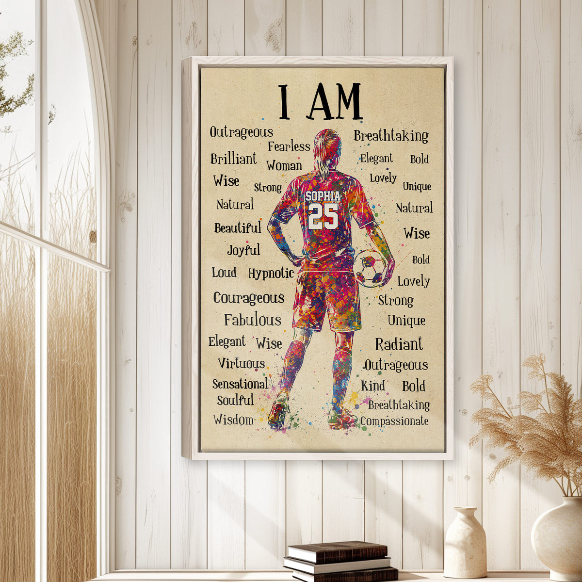 Soccer wall art displayed in a bright home interior with a white wood frame and colorful player design
