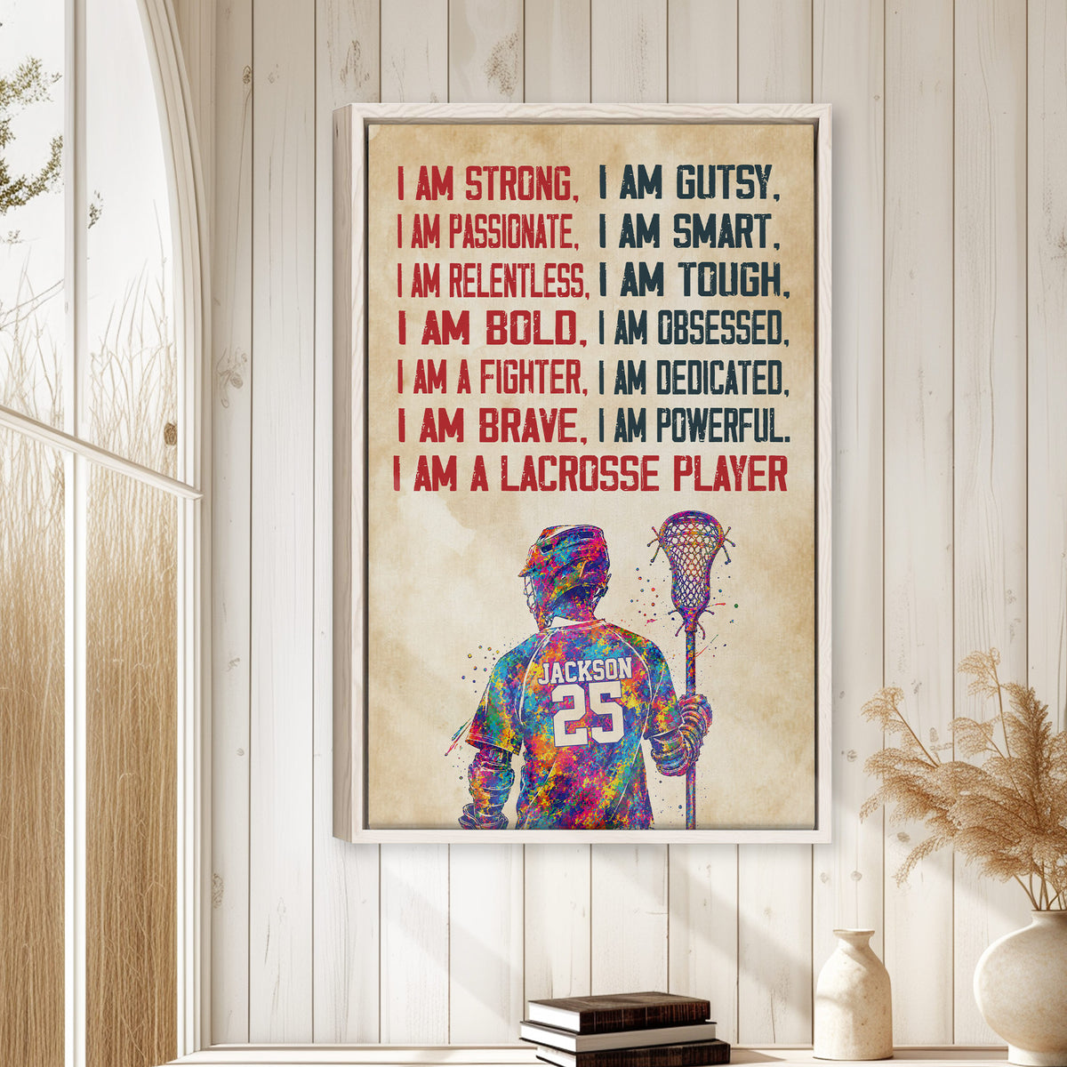 Framed lacrosse wall art displayed on a light wood-paneled wall in a bright room