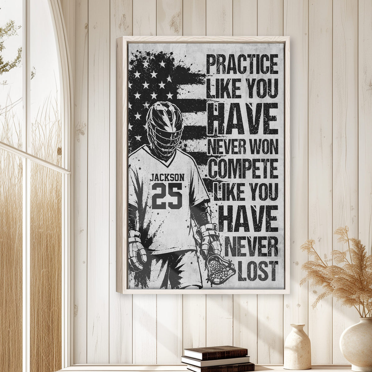 Lacrosse wall art displayed in a bright wood-paneled room above stacked books