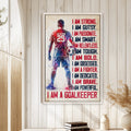 Framed soccer goalkeeper wall art displayed on a light paneled wall in a home setting