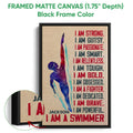 Black framed canvas swimming wall art with a colorful swimmer silhouette and motivational design