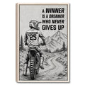 Framed motocross wall art showing a dirt bike rider on a mountain trail with motivational artwork