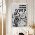Motocross wall art displayed in a bright wood-paneled room above a stack of books
