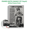 White framed motocross canvas wall art featuring a rider, dirt bike, and dramatic black typography