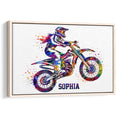 Framed motocross wall art featuring a colorful dirt bike rider in motion