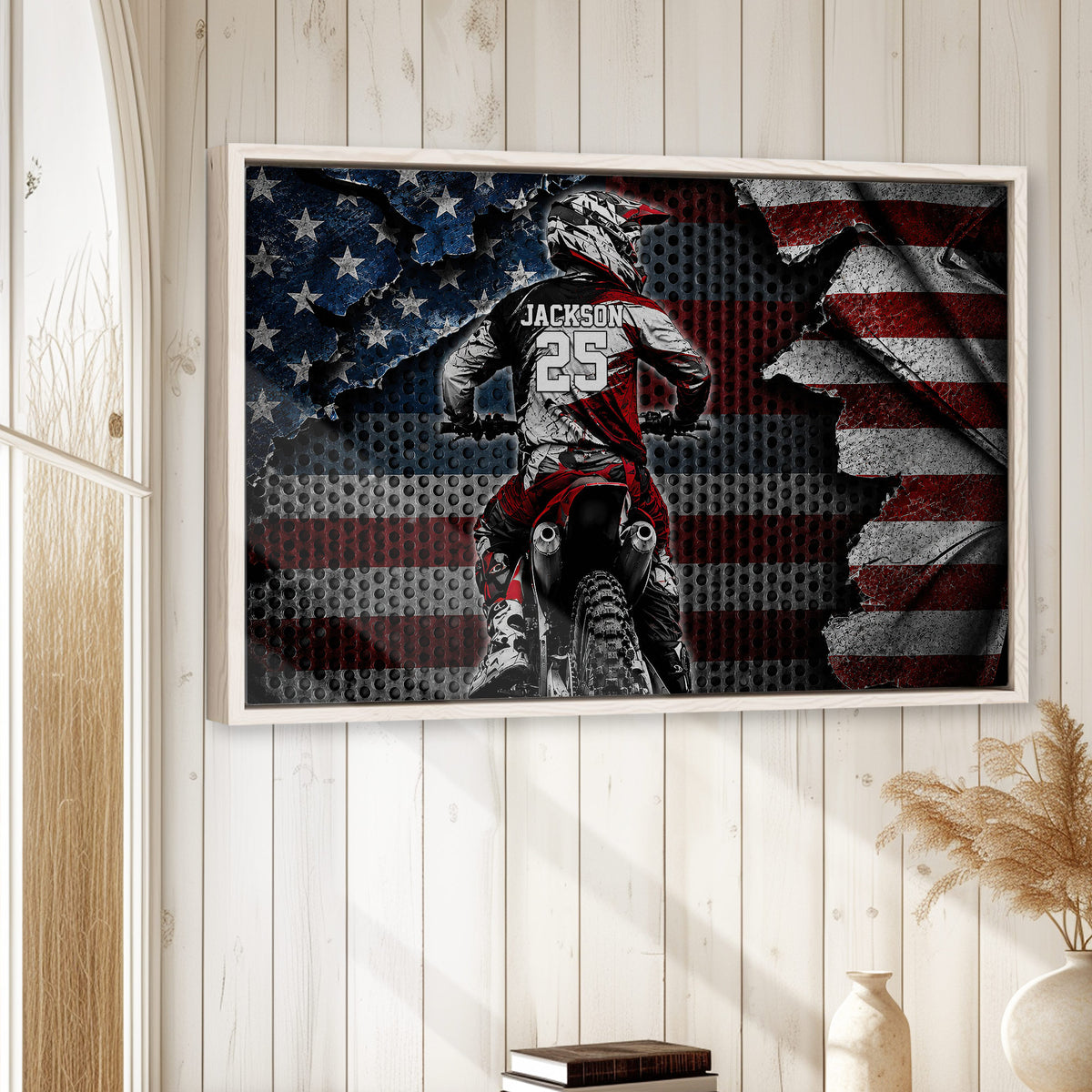 Motocross framed wall art displayed on a light wood-paneled wall in a home interior