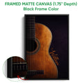 Framed matte canvas guitar wall art shown with a black frame and close-up detail