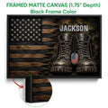 Black framed canvas veteran wall art with combat boots, American flag imagery, and a detailed woodgrain background