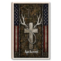 Framed hunting wall art featuring white deer antlers, woodland camouflage, and patriotic flag accents