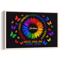 Framed LGBT pride wall art with a colorful sunflower, butterflies, and an inclusive message on a dark background