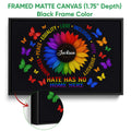 Black framed LGBT pride canvas featuring a multicolor sunflower, butterflies, and a hate-free message