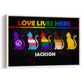 Framed LGBT wall art featuring five colorful pride flag cats on a black background